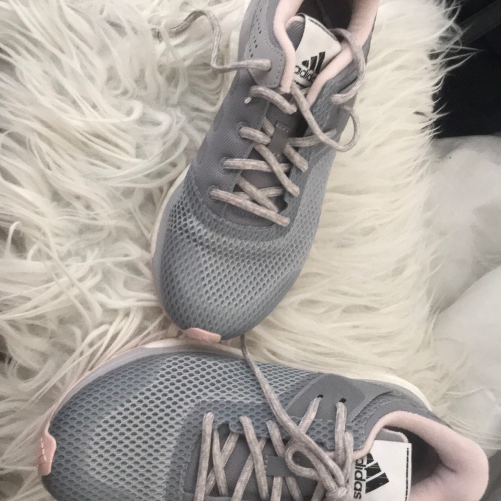 woman’s adidas running shoes NBW size 7